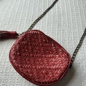 Anthropologie dark orange basket weaved purse.